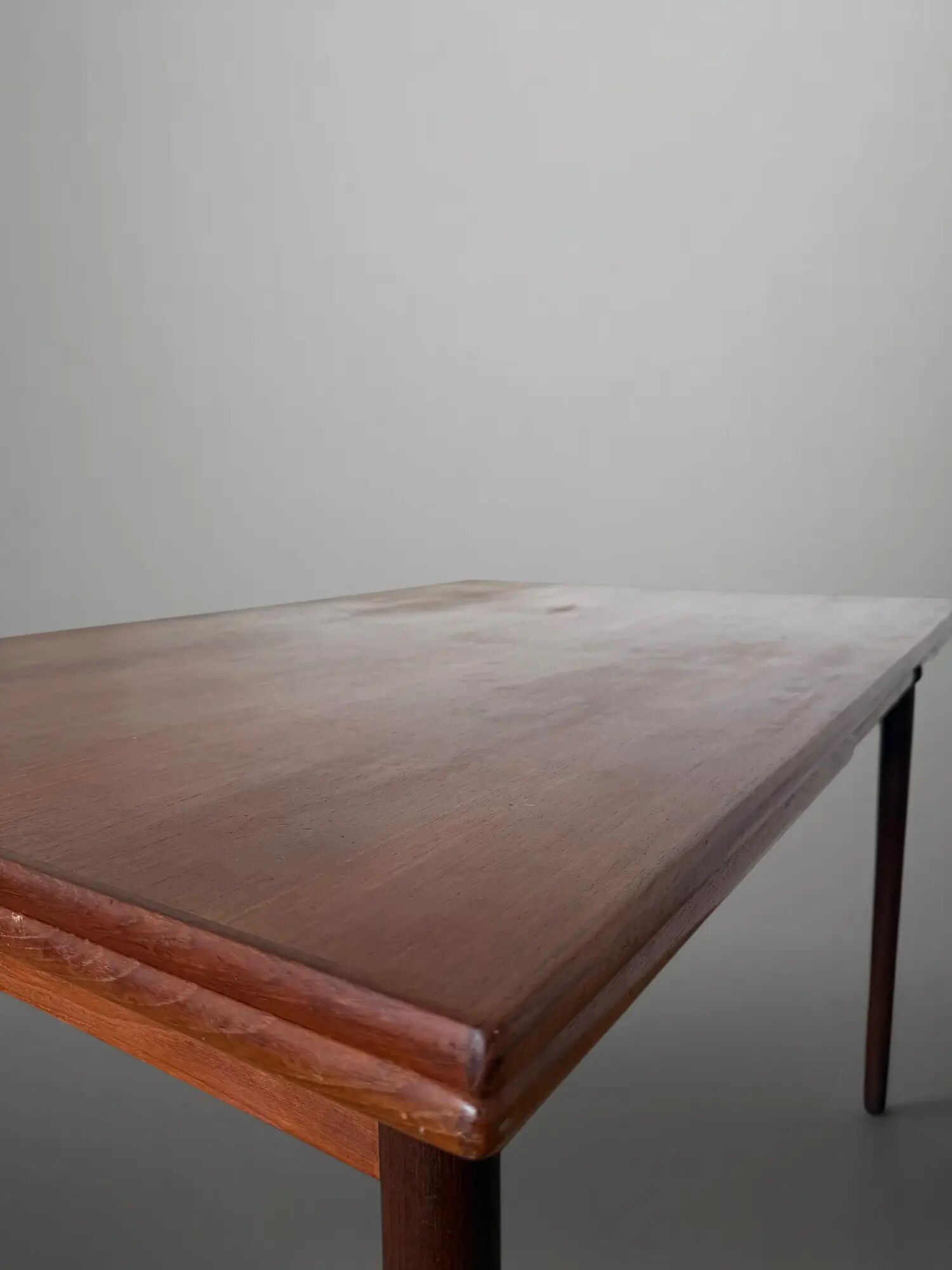 Scandinavian extendable dining table in teak