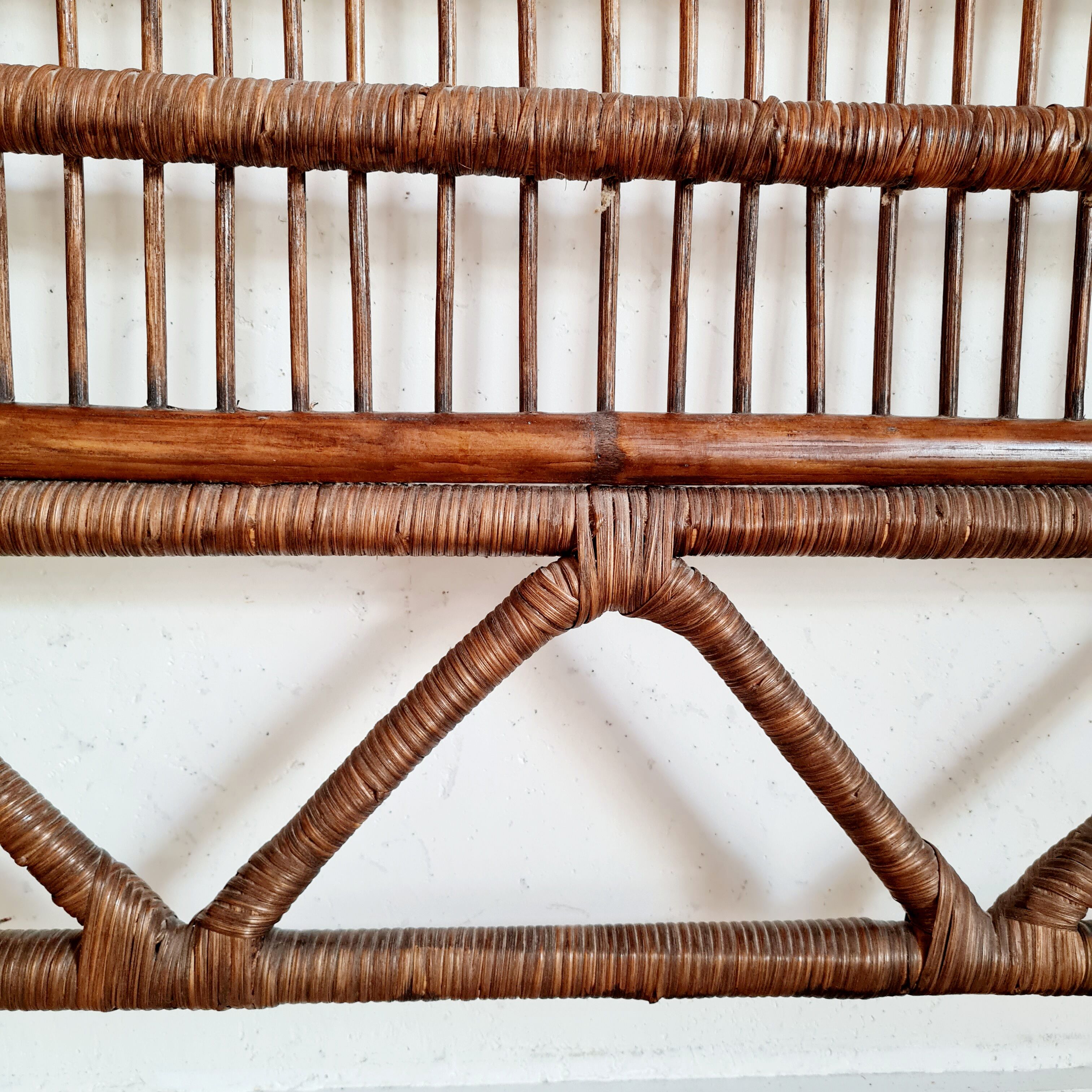 Peacock headboard in vintage rattan