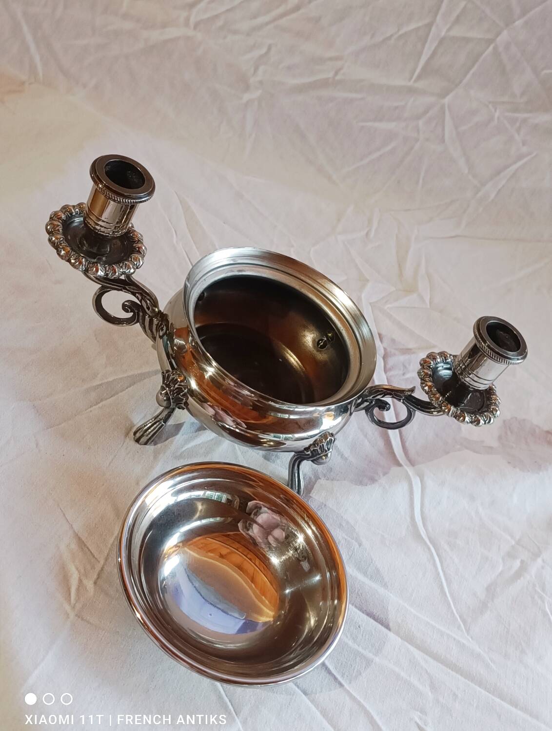 Silver-plated candlestick burns scented oil, Art Nouveau style, late 19th century.