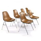 6 Herman Miller Eames stacking shell chairs with brown naugahyde pads