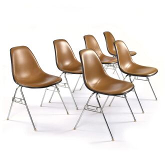 6 Herman Miller Eames stacking shell chairs with brown naugahyde pads