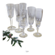 Mismatched set of prestigious crystal champagne flutes