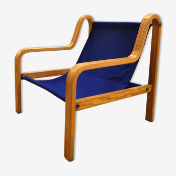 Scandinavian curved wooden armchairs