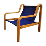 Scandinavian curved wooden armchairs