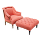 Napoleon III salon armchair in brick red linen with a tufted footrest.