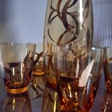 Amber crystal decanter and 5 matching glasses.