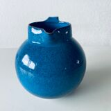 Old pitcher in glazed stoneware