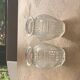 Two hyacinth vases in molded glass with vintage geometric patterns