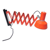 Orange accordion wall light from the 70s.