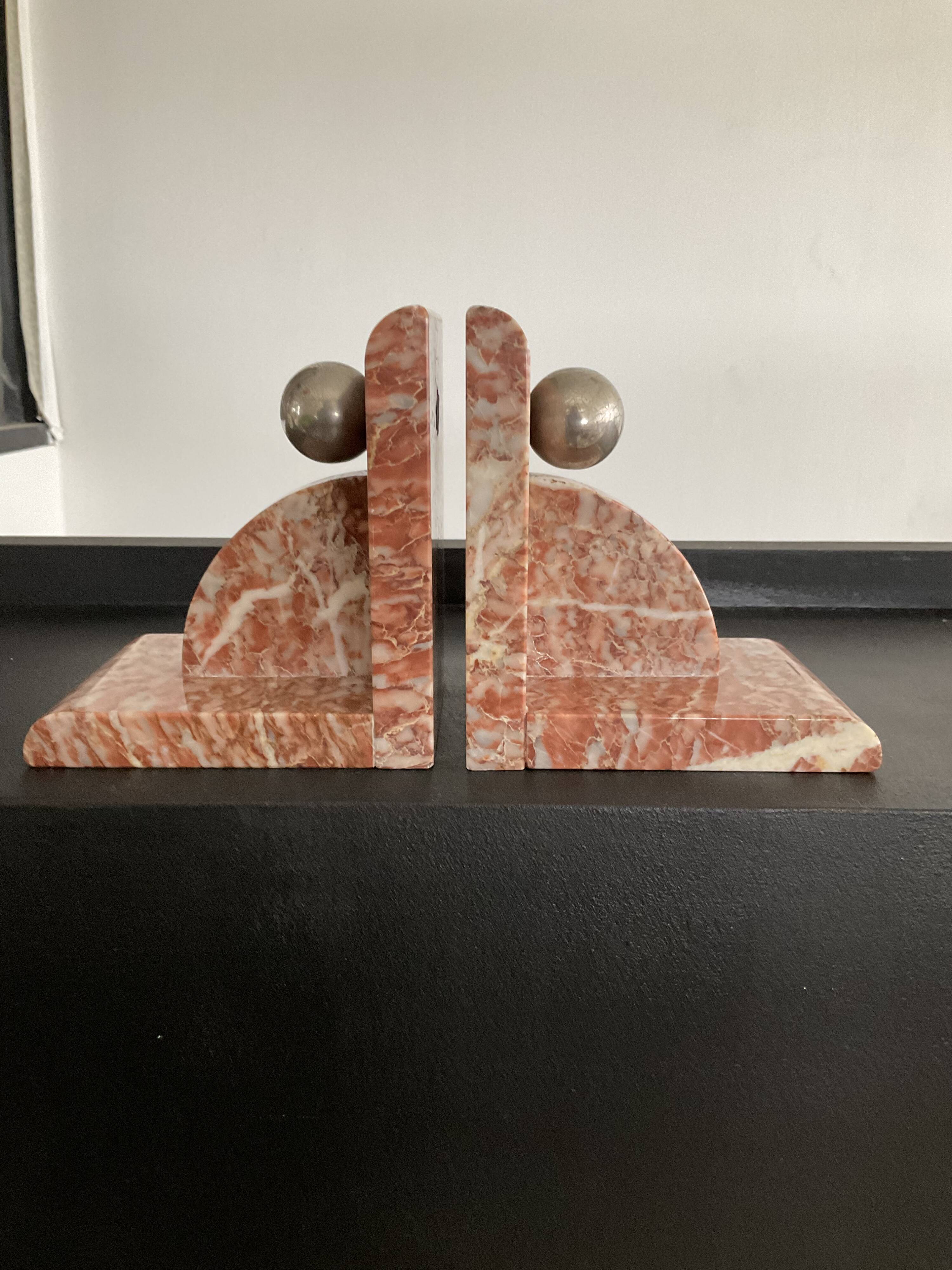 Pair of art deco series-books in marble and brass