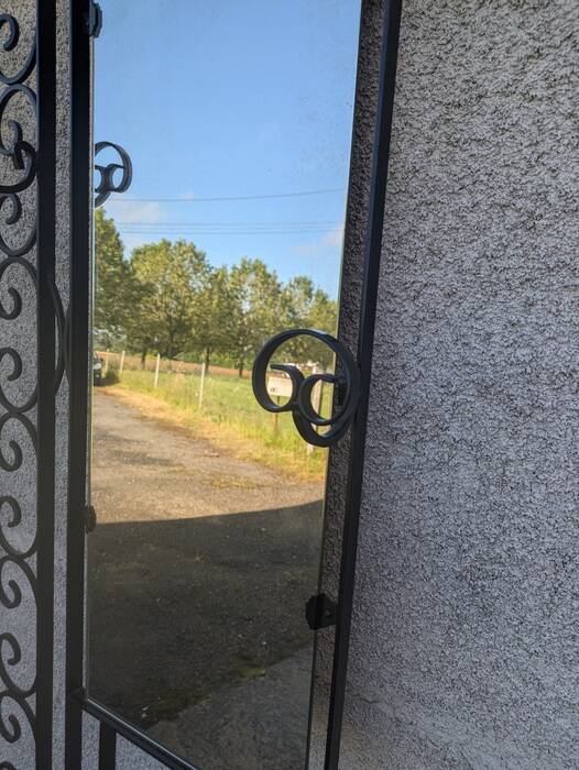 Wrought iron coat rack