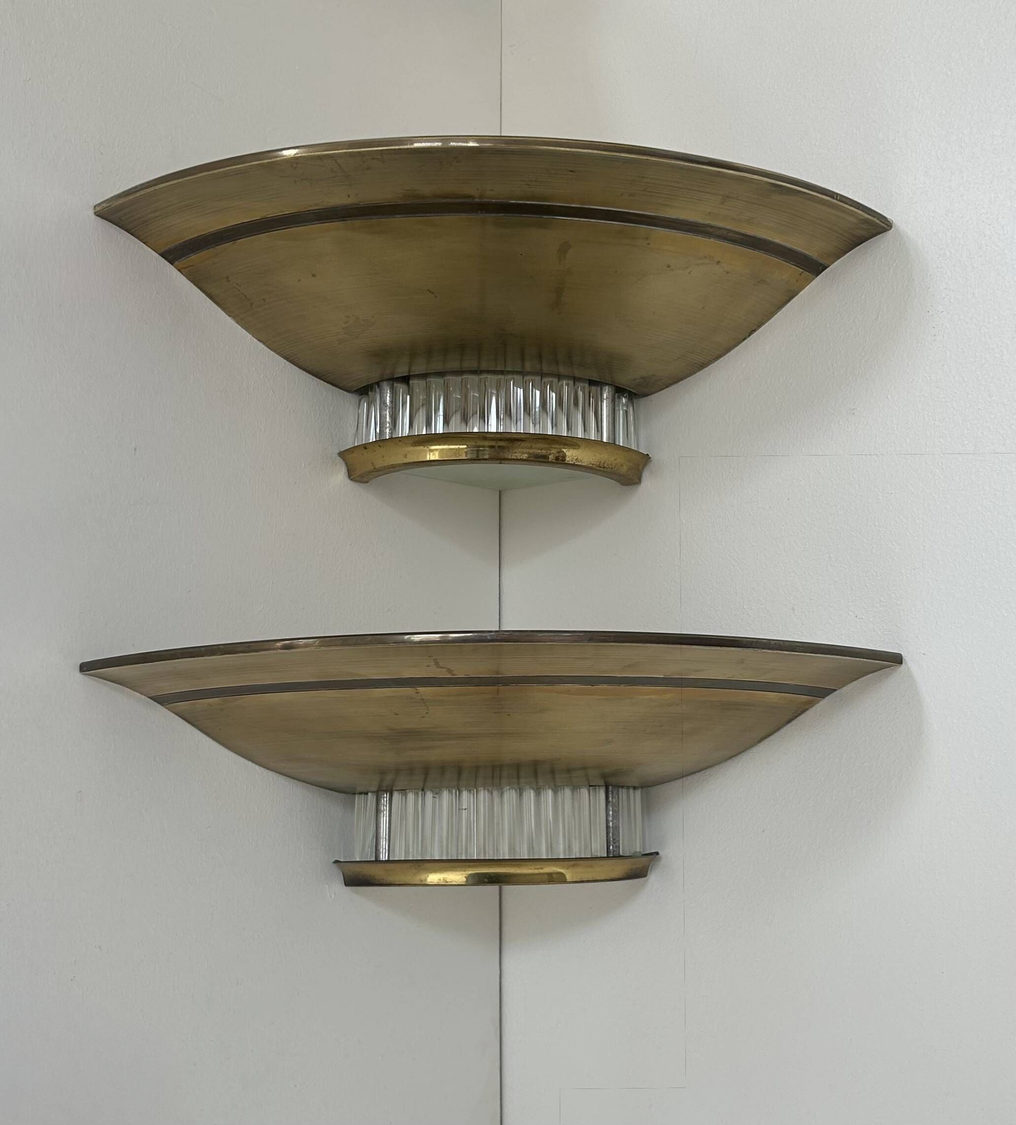 Pair of Art Deco corner sconces, brass and glass, France 1930