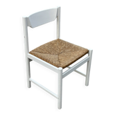 Vintage chair with wicker seat, minimalist design