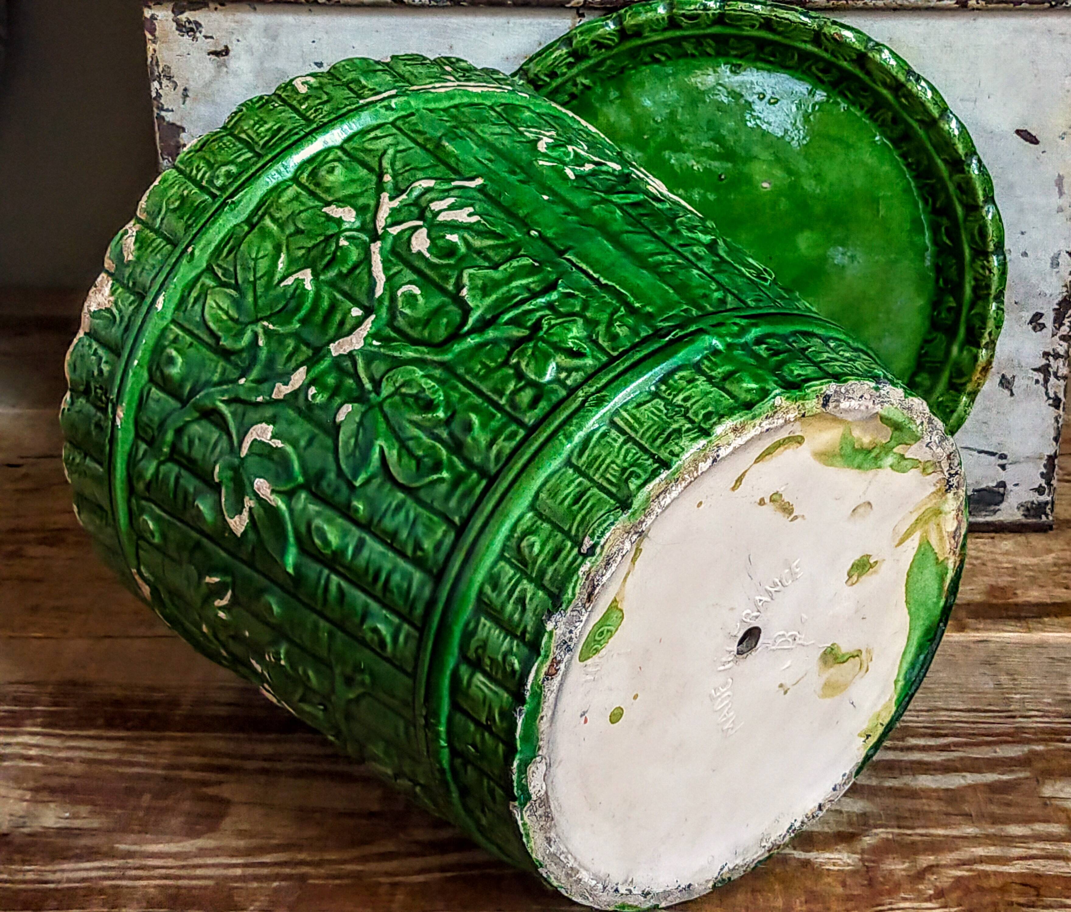 Flower pot and saucer in slip by G. De Bruyn 19th century