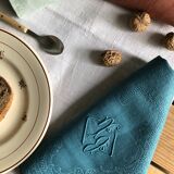 Set of four napkins dyed in multiple colors