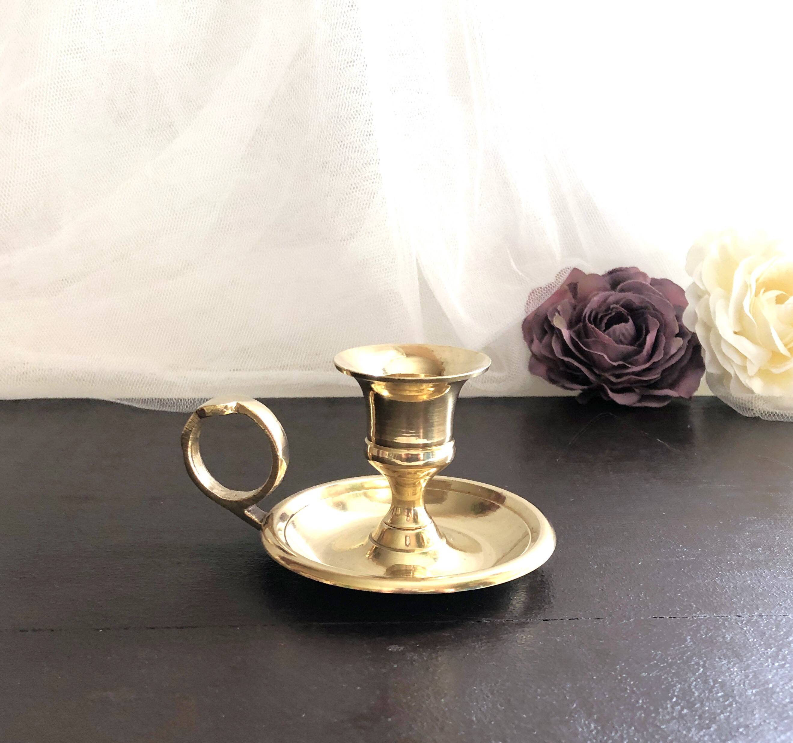 Hand candle holder called "Cave Rat" vintage golden brass