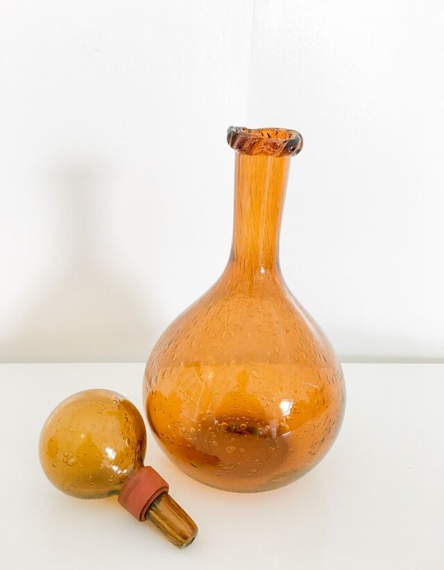 Biot blown glass amber bottle