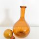 Biot blown glass amber bottle