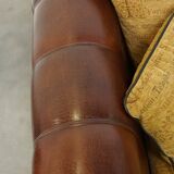 Luxurious and spacious two-seater sheepskin sofa of top quality with fabric cushions