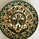 Decorative ceramic plate with bread motif, wall plaque from Jerusalem.