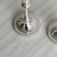 Pair of white metal candlesticks