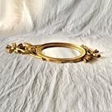 Vintage Empire style wall mirror in gold resin