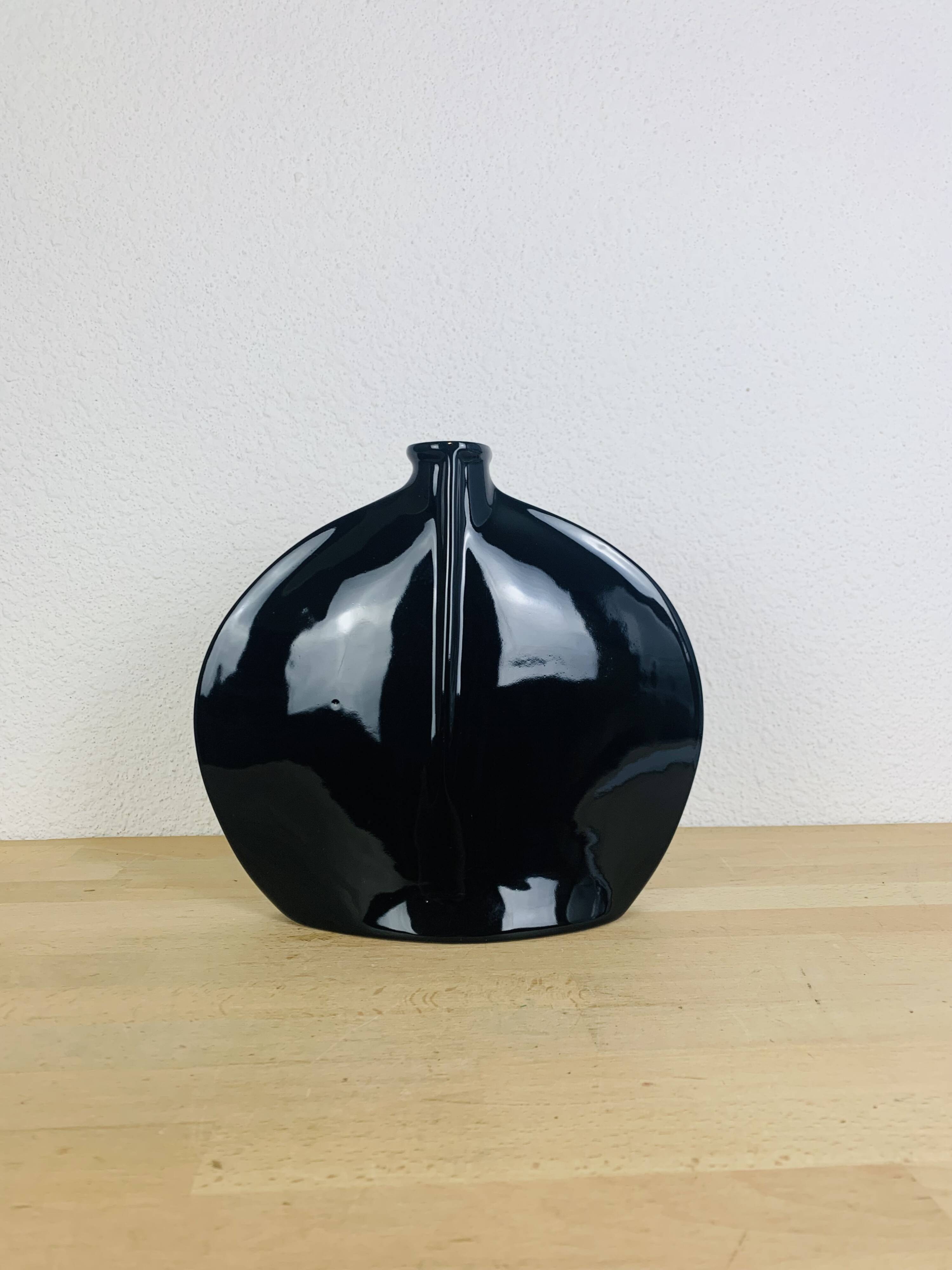 Vintage black ceramic lentil vase