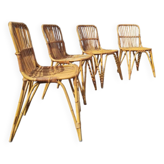 Ensemble de quatre chaises en rotin 1960