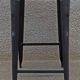 Pair of black metal stools