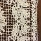 Old napperon in knotted and hand-embroidered fillet