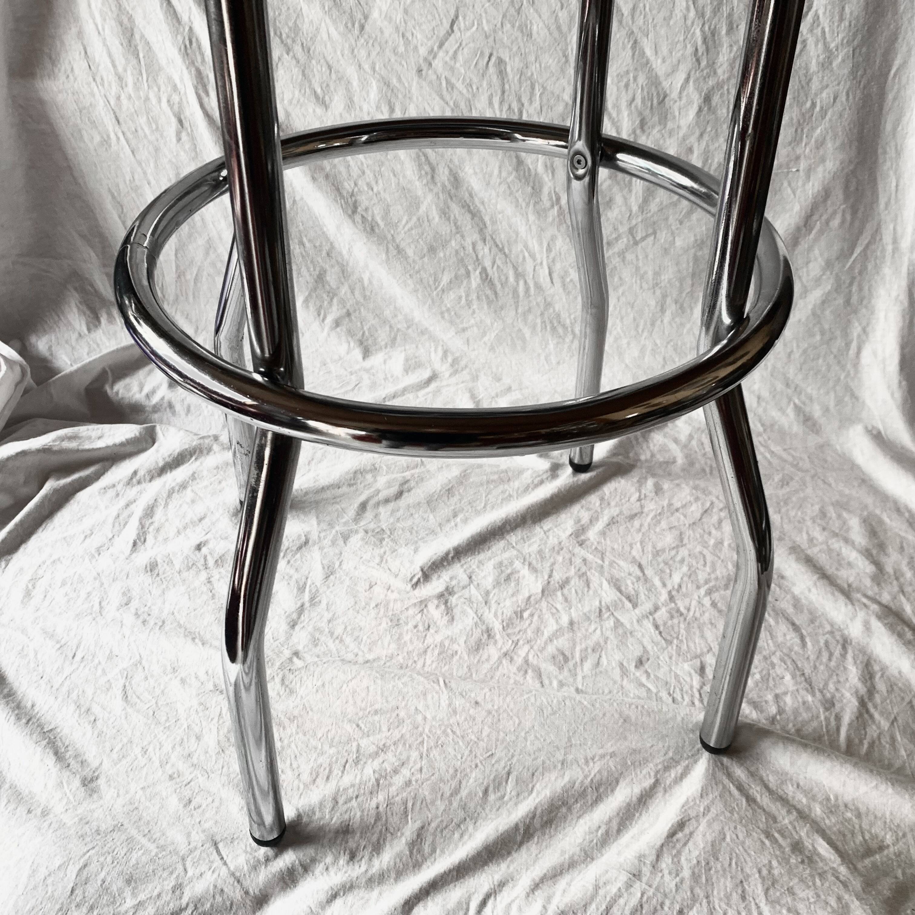 Vintage bar stool in black skai and chrome metal
