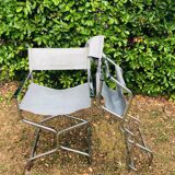 Pair of folding metal and leather armchairs