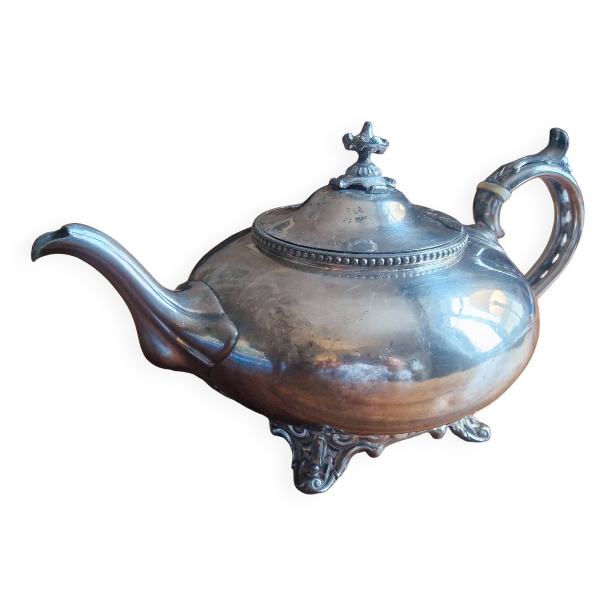 Silver-plated metal teapot in English style