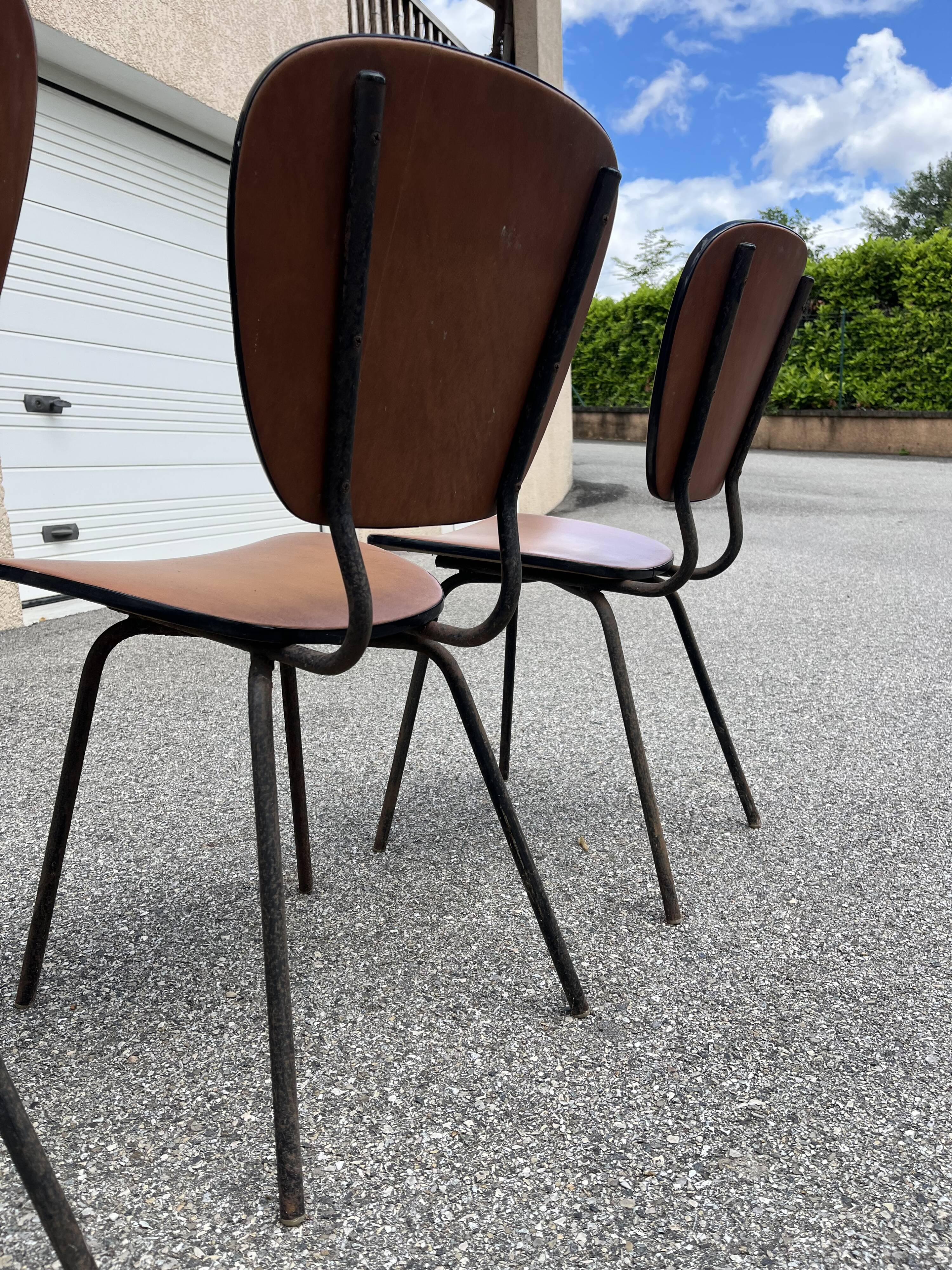 4 vintage brown faux leather chairs