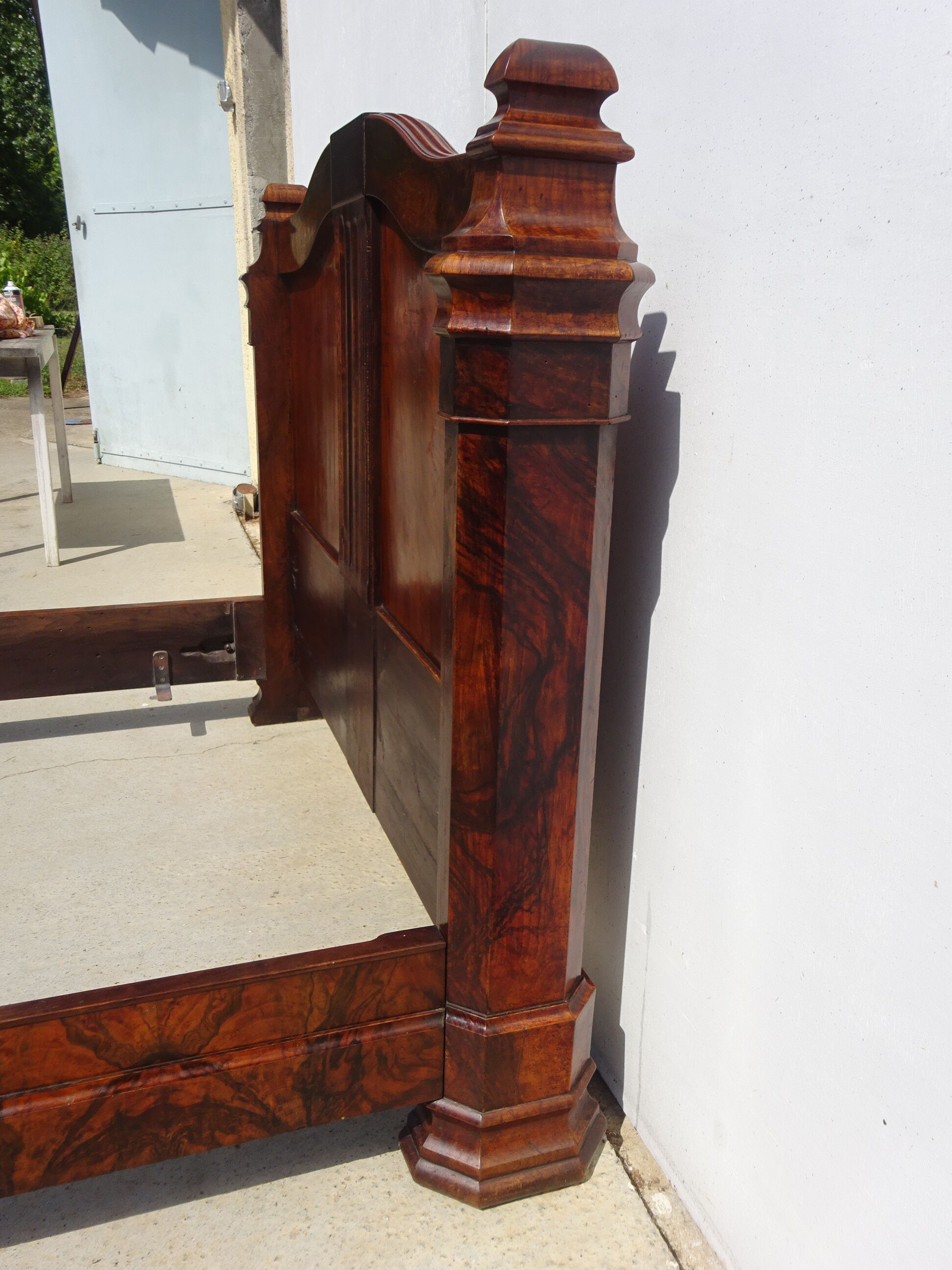 Walnut bed and walnut magnifying glass nineteenth century