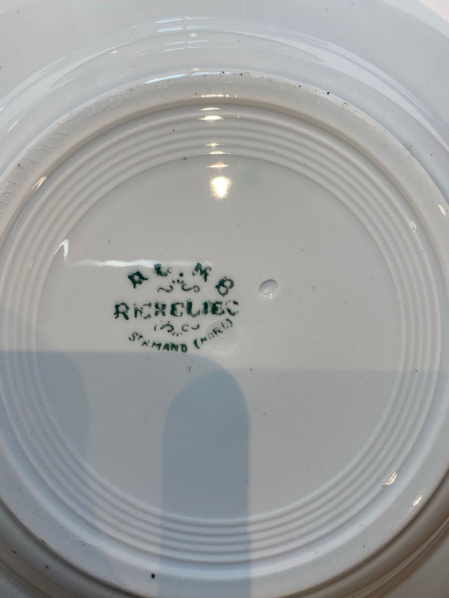 Set of 4 hollow plates, foliage decorations, Manufacture de St-Amand-les-Eaux