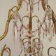 French gilt bronze three-light cage chandelier with pink and clear beaded swags.
