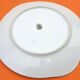 Serving dish with handles, fine Bohemian porcelain with floral decoration on a background.