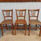 3 wooden bistro chairs