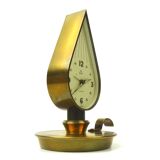 Belle rare horloge de bureau en laiton du milieu du siècle Swiza en forme de bougie Hollywood Regency Suisse 1950