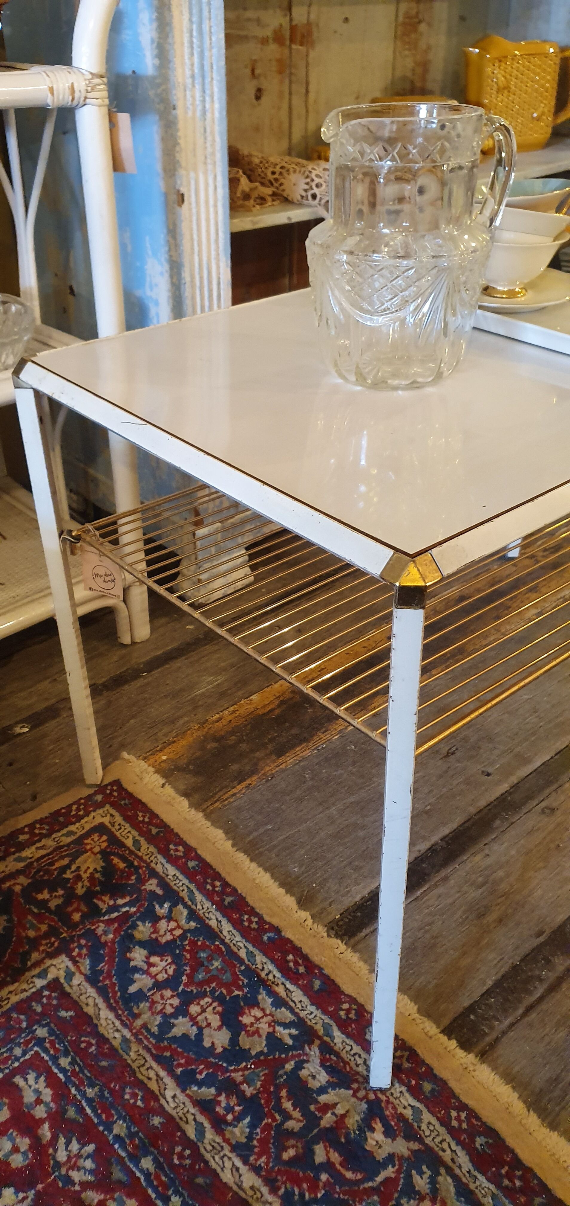 White coffee table and vintage gold metal