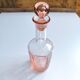Vintage pink glass bottle
