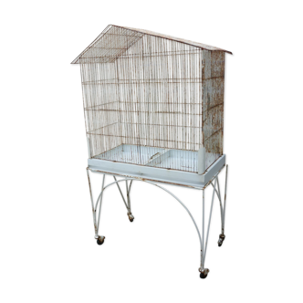 Bird cage with its wheeled holder