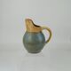 Two-tone pitcher in sandstone by Louis Lourioux