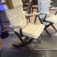 Rocking lounge chair made of fabric suitable for outdoor use.