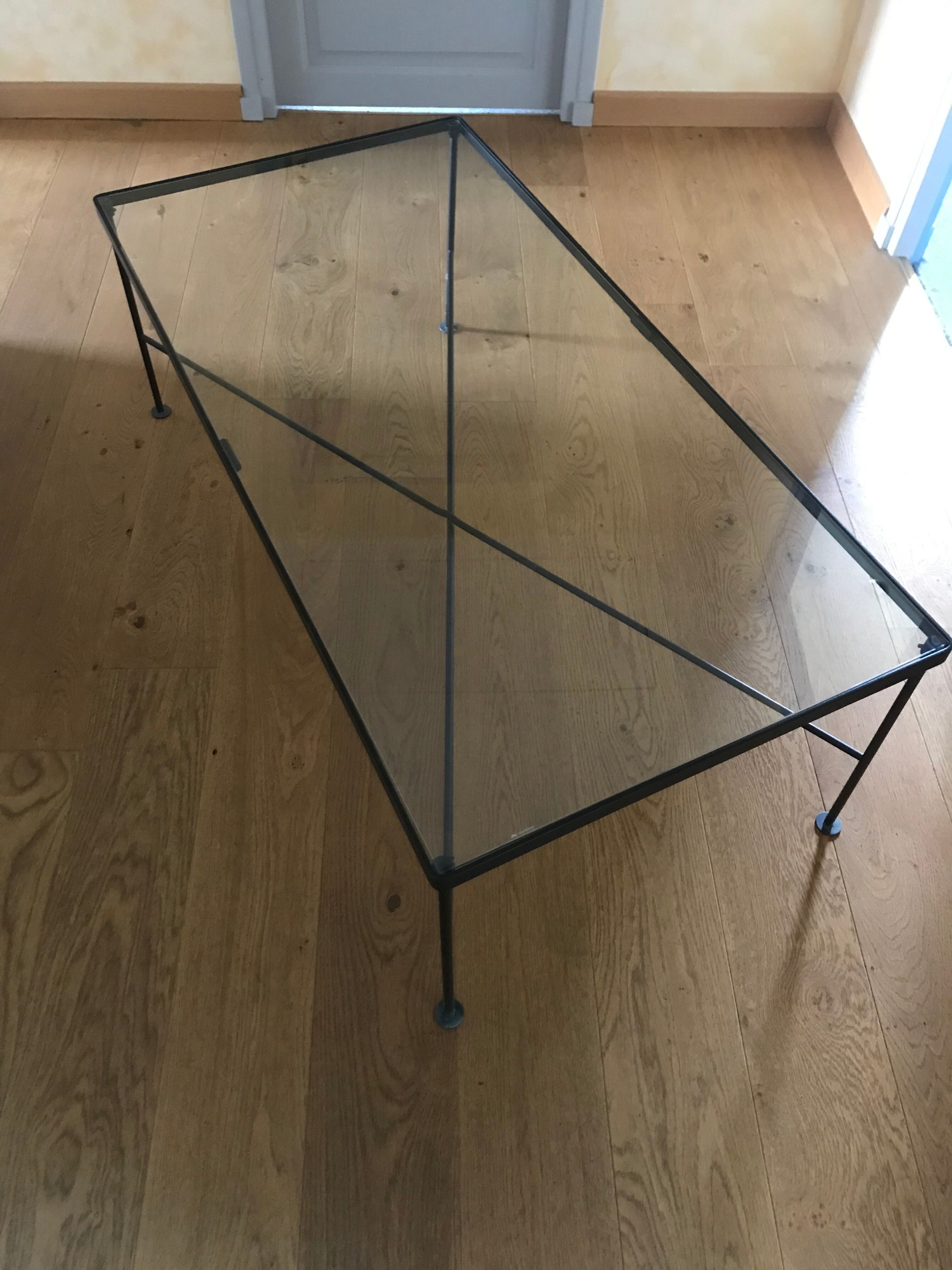 Glass and black metal coffee table