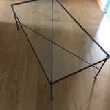 Glass and black metal coffee table