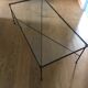 Glass and black metal coffee table