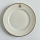 Service d’assiettes à bord doré, monogrammées | E. Bourgeois | Fin XIX