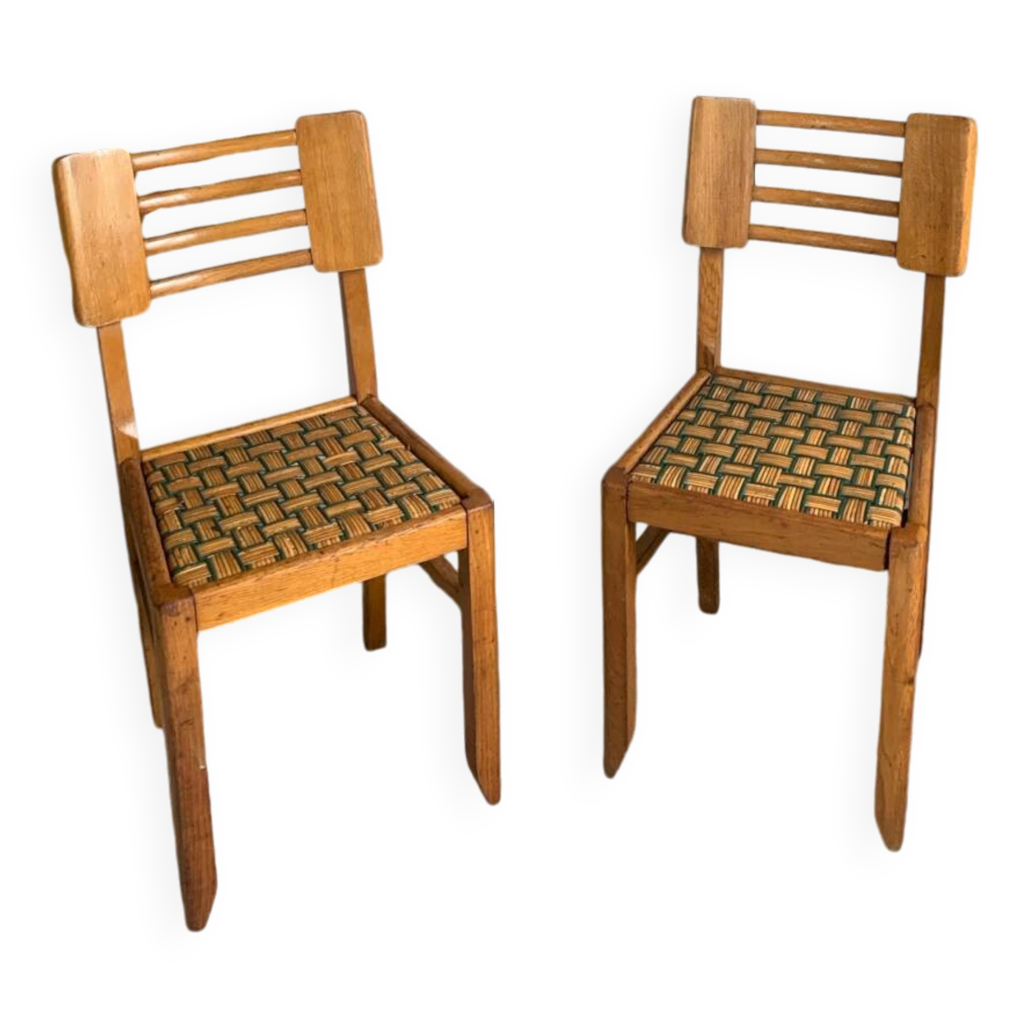 Pair of chairs in the style of Pierre Cruege